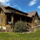 Log Cabin with Large Pole Barn on Acreage countryside group land and rural home experts