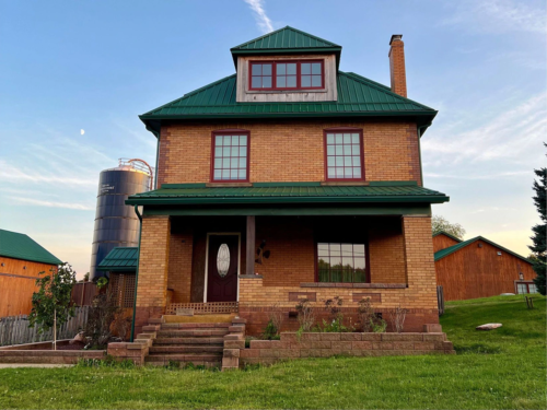 home for sale 2 bed two and a half bath covered with porch and detached garage and barn in beaver falls pa