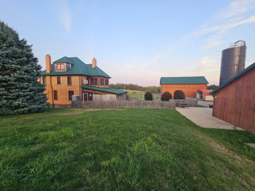 home for sale with buildings perfect for hunting and fishing