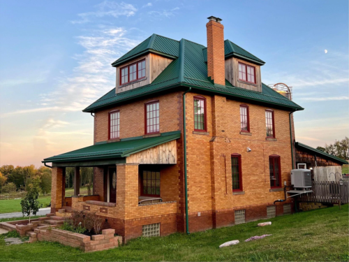 renovated home for sale 2 bed two and a half bath covered with metal roof and detached garage and barn in beaver falls pa